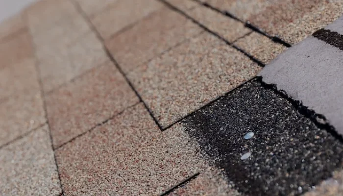 masthead inspecting and replacing roof shingles
